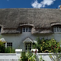Buy canvas prints of  A thatched cottage  in Avebury by Peter Wiseman