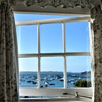 Buy canvas prints of A window with a harbour view by Peter Wiseman