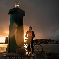 Buy canvas prints of Cycling through Mallorcan storm by Genia Tkacheva