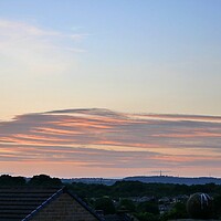 Buy canvas prints of Streaky sunset sky by Roy Hinchliffe