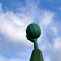 Buy canvas prints of Green metal hand and ball by Roy Hinchliffe
