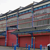 Buy canvas prints of Market building in Huddersfield by Roy Hinchliffe