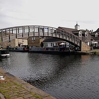 Buy canvas prints of canal marina footbridge Huddersfield by Roy Hinchliffe