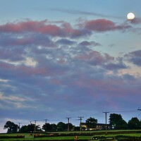 Buy canvas prints of Sunset with moon in Holmfirth by Roy Hinchliffe