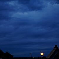 Buy canvas prints of Lamplight blue night sky in Yorkshire by Roy Hinchliffe