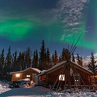 Buy canvas prints of Aurora Borealis, Northern Lights, over aboriginal wooden cabin at Yellowknife, Northwest Territories, Canada by Chun Ju Wu