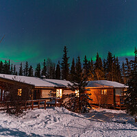 Buy canvas prints of Aurora Borealis, Northern Lights, over aboriginal wooden cabin at Yellowknife, Northwest Territories, Canada by Chun Ju Wu