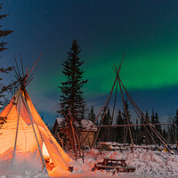 Buy canvas prints of Aurora Borealis, Northern Lights, over aboriginal tent teepee at Yellowknife, Northwest Territories, Canada by Chun Ju Wu