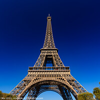 Buy canvas prints of Eiffel Tower with sunny blue sky in Paris, France by Chun Ju Wu