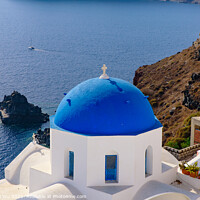 Buy canvas prints of Blue domed church and traditional white houses facing Aegean Sea in Oia, Santorini, Greece by Chun Ju Wu