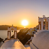 Buy canvas prints of Bell tower with warm sunset light in Oia, Santorini, Greece by Chun Ju Wu