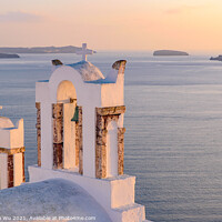 Buy canvas prints of Bell tower with warm sunset light in Oia, Santorini, Greece by Chun Ju Wu