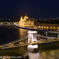 Buy canvas prints of Night panorama of Hungarian Parliament Building, Széchenyi Chain Bridge, and River Danube in Budapest, Hungary by Chun Ju Wu