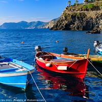 Buy canvas prints of Fishing boats at Manarola, one of the five Mediterranean villages in Cinque Terre, Italy, famous for its colorful houses and harbor by Chun Ju Wu