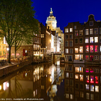 Buy canvas prints of Night view of buildings and boats along the canal in Amsterdam, Netherlands by Chun Ju Wu