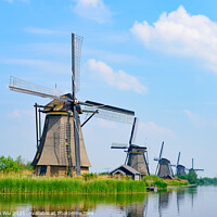 Buy canvas prints of The windmills in Kinderdijk, a UNESCO World Heritage site in Rotterdam, Netherlands by Chun Ju Wu