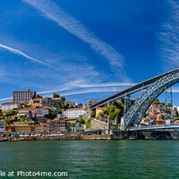 Buy canvas prints of Panorama of the riverbank of Ribeira District and Dom Luis I Bridge in Porto, Portugal by Chun Ju Wu