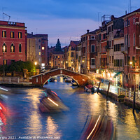 Buy canvas prints of Night view of the canal, bridge, and old buildings in Venice, Italy by Chun Ju Wu
