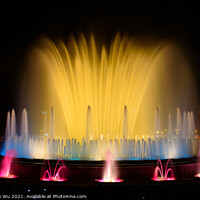 Buy canvas prints of The colorful water show of Magic Fountain of Montjuic with light and music in Barcelona , Spain by Chun Ju Wu