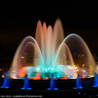 Buy canvas prints of The colorful water show of Magic Fountain of Montjuic with light and music in Barcelona , Spain by Chun Ju Wu