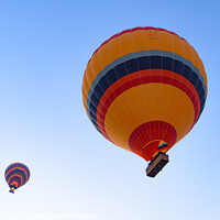 Buy canvas prints of Flying hot air balloons in the sky in Goreme, Cappadocia, Turkey by Chun Ju Wu