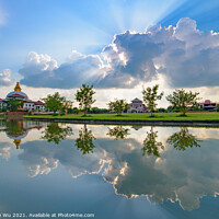 Buy canvas prints of Reflection of a Buddhist temple on water at Lumbini, Nepal, the birth place of Buddha by Chun Ju Wu