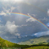 Buy canvas prints of A rainbow among mountains in cloudy day by Chun Ju Wu