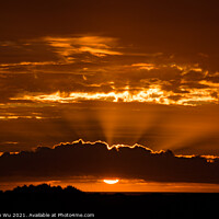 Buy canvas prints of The light of sunset through the clouds with colorful sky by Chun Ju Wu