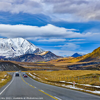 Buy canvas prints of Road trip in winter with snow mountains at backgro by Chun Ju Wu