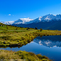 Buy canvas prints of Snow mountains and reflection on lake in South Island, New Zealand by Chun Ju Wu