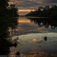 Buy canvas prints of Sunset Reflection by Roger Worrall