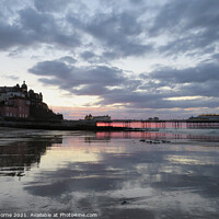 Buy canvas prints of Cromer Pier Sunset and Reflections by Jane Osborne