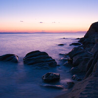 Buy canvas prints of Long exposure of sea around rocks on beach by Nic Croad
