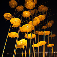 Buy canvas prints of  The Famous Umbrella Sculpture in Thessaloniki, Gr by Nic Croad