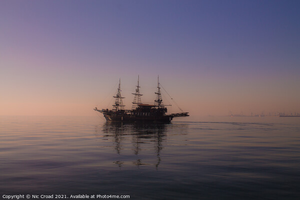 Ship on calm sea in Thessaloniki, Greece. Picture Board by Nic Croad
