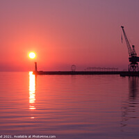 Buy canvas prints of Port crane at sunset by Nic Croad