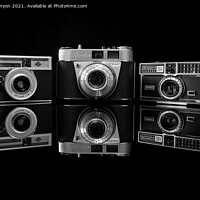 Buy canvas prints of Trio of vintage cameras by Gary A Kenyon