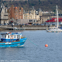 Buy canvas prints of Boats in the harbour Oban Scotland by christian maltby