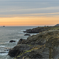 Buy canvas prints of Watching the sunset at Treyarnon Bay, Cornwall  by Frank Farrell