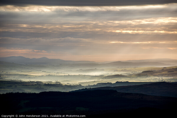 Welsh sunrise landscape. Picture Board by John Henderson