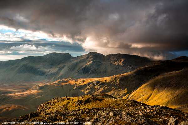 Scafells sunset from the Crinkle Crags ridge. Picture Board by John Henderson