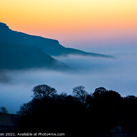 Buy canvas prints of Sunset inversion on the slopes of Ingleborough hil by John Henderson