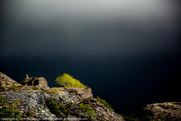 Llanberis slate quarry before the storm Picture Board by John Henderson