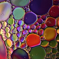 Buy canvas prints of Rainbow Bubbles by Jules D Truman