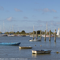 Buy canvas prints of  boats at brightlingsea harbour by Michael bryant Tiptopimage