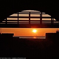 Buy canvas prints of Water tunnel and wooden footbridge  sunset by Mark Ritson