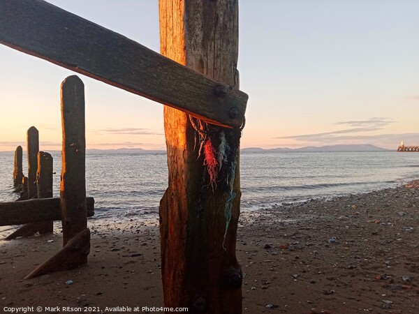 Sun on the groyne post  Picture Board by Mark Ritson