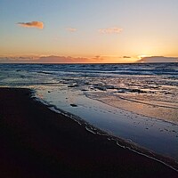 Buy canvas prints of Sunset over the sea and sand  by Mark Ritson