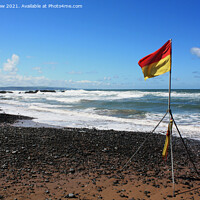 Buy canvas prints of Lifeguard Flag on Sandymouth Beach, Bude, Cornwall by Allan Snow