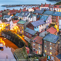 Buy canvas prints of Sunset in Staithes by Daniel Nicholson